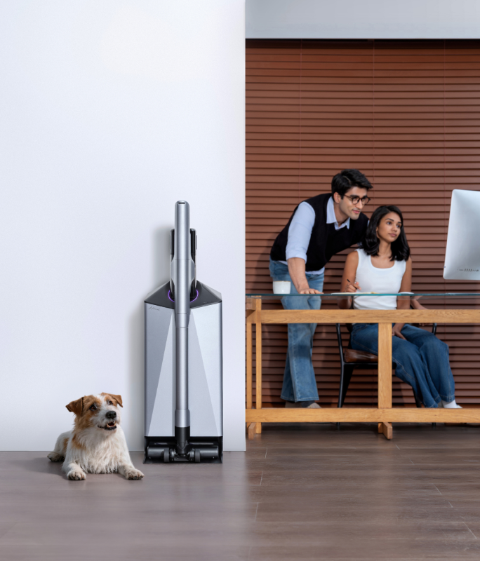 Narwal V50 Cube station beside a dog and a home office